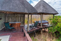 A private terrace with outdoor bath and plunge pool in Royal Zambezi Lodge.